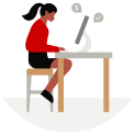 Woman using a computer at a desk.